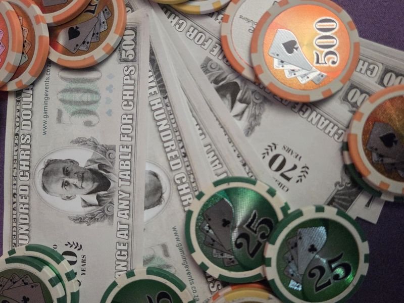 Fun money notes and casino chips used instead of real cash at a fun casino event